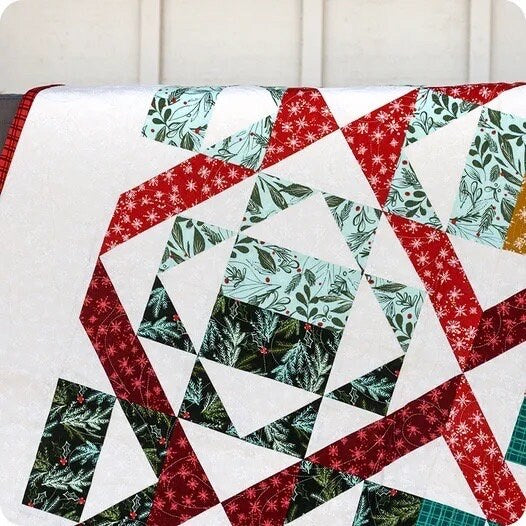 It's Sew Emma Poinsettias Quilt Pattern Finished Size: 54.5"x69.5"