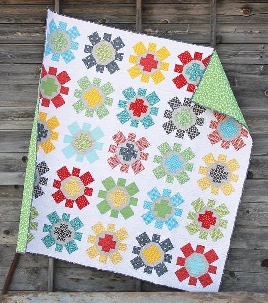 Cluck Cluck Sew Spin Cycle Quilt Pattern Finished Size: 75"x75"